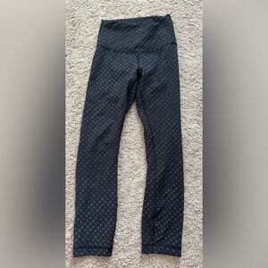 Lululemon logo tights/leggings size 4, inseam 23